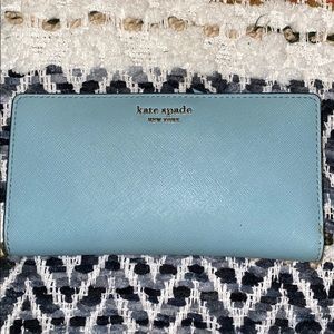 kate spade light blue Saffiano zip continental wallet with gold logo
